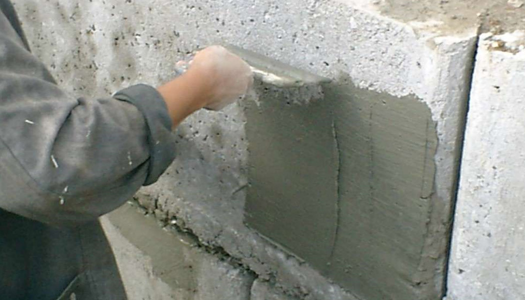 Aplicación del mortero pantalla impermeable de Sopgal